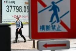 Asian shares shoot higher as US stocks inch toward their records