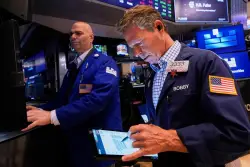 Wall Street loses ground and oil prices tumble after OPEC+ says it will step up production